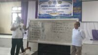 Reynold Mandha bersama pegawai Kemenag Yahukimo saat memfasilitasi pemilihan pengurus FKUB Kabupaten Yahukimo Periode 2026-2030