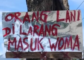 Setelah Rekonsiliasi, Spanduk Provokatif Terpampang di Depan Pos Brimob Wouma