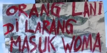 Setelah Rekonsiliasi, Spanduk Provokatif Terpampang di Depan Pos Brimob Wouma