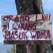 Setelah Rekonsiliasi, Spanduk Provokatif Terpampang di Depan Pos Brimob Wouma
